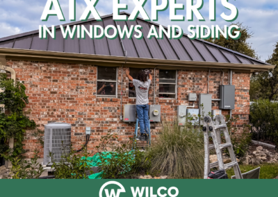 A worker installing windows on a brick house with a logo for WILCO Windows & Siding and the text "ATX EXPERTS IN WINDOWS AND SIDING" displayed.